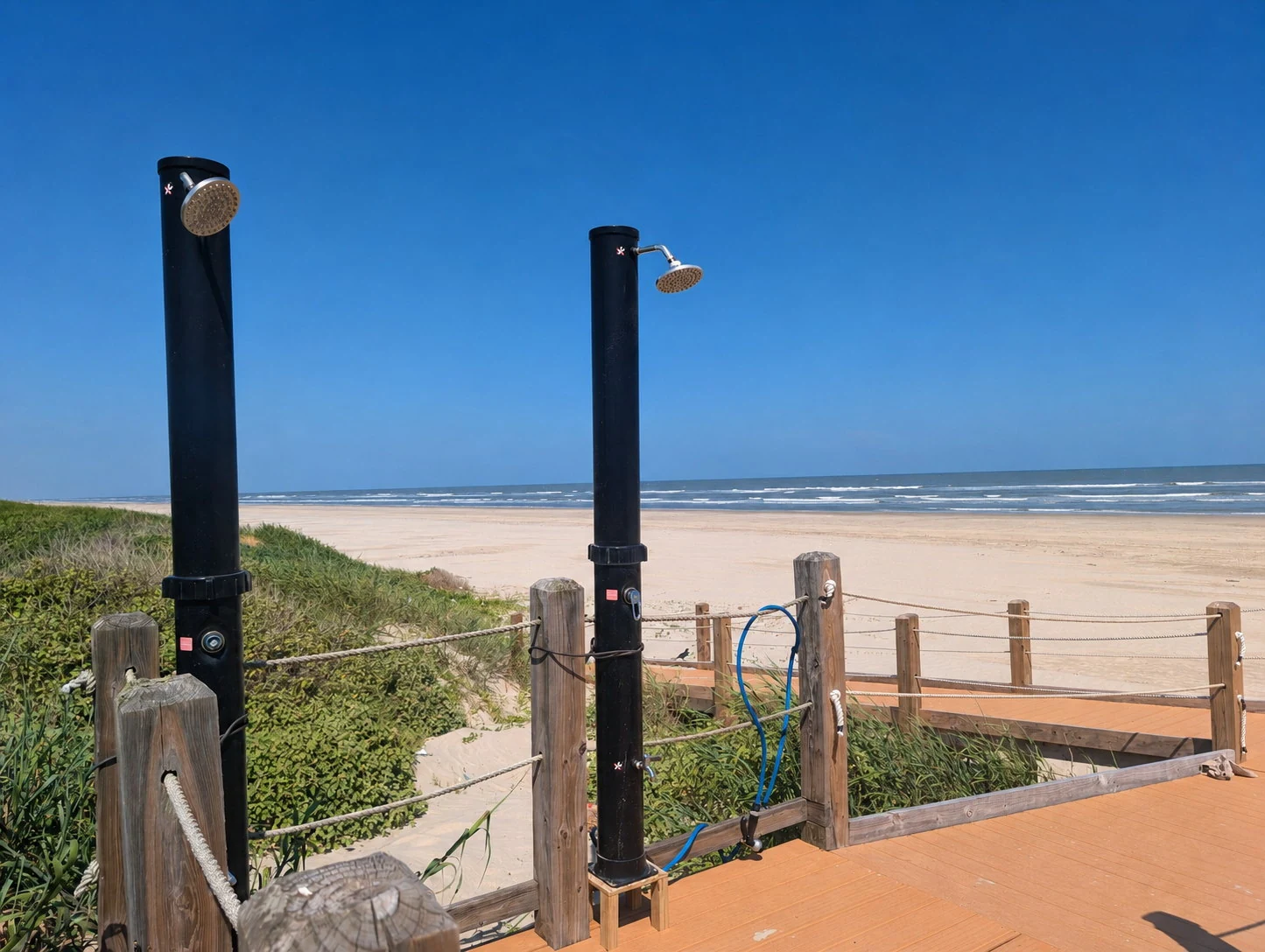 The Coastal Refresh outdoor rinse-off showers at the Gulf end of the Seahorse Promenade