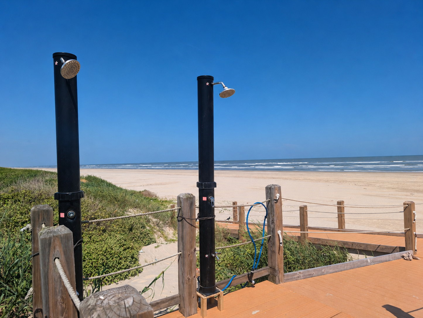 The Coastal Refresh outdoor rinse-off showers at the Gulf end of the Seahorse Promenade