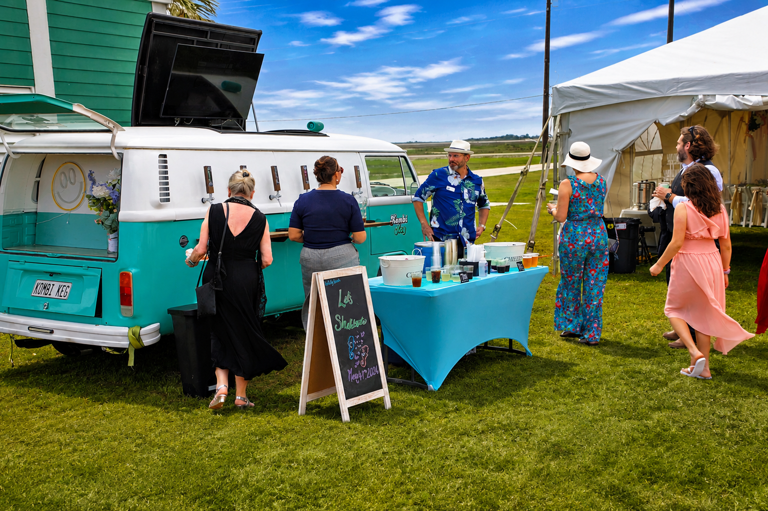Guests enjoying coastal hospitality from the Seahorse Kombi beverage center