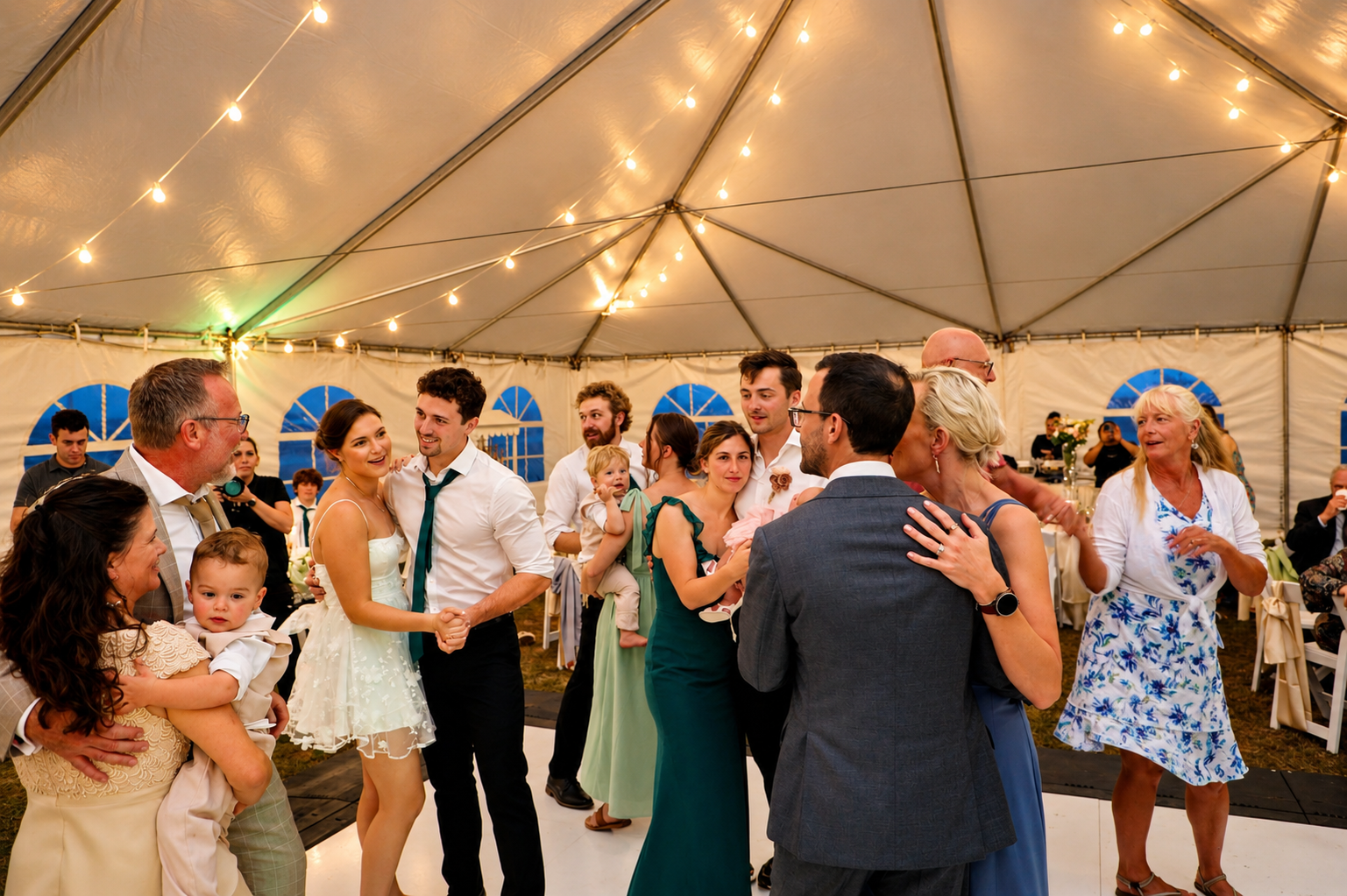 Guests dancing at a Seahorse beachfront reception